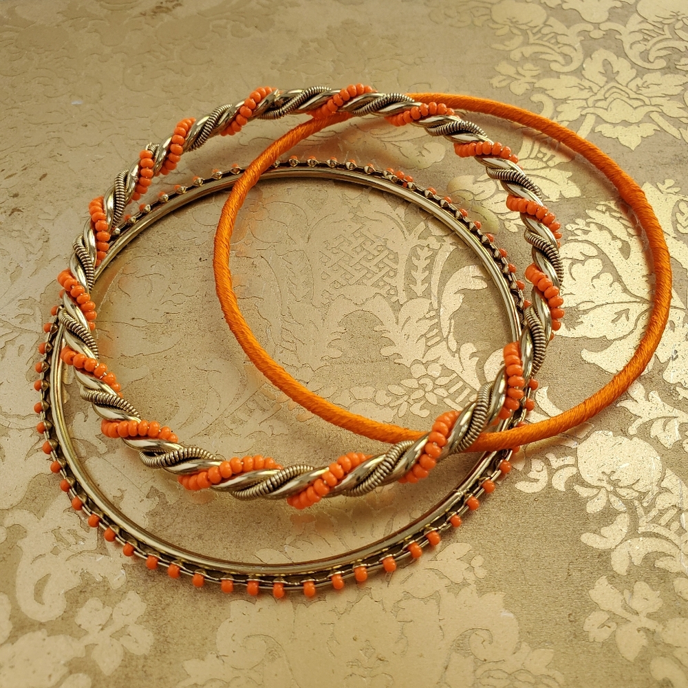 NWOT Three Orange /Gold Bangles